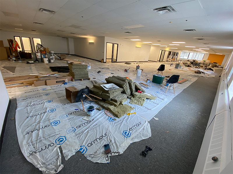 Office before cleaning - cluttered and dirty workspace