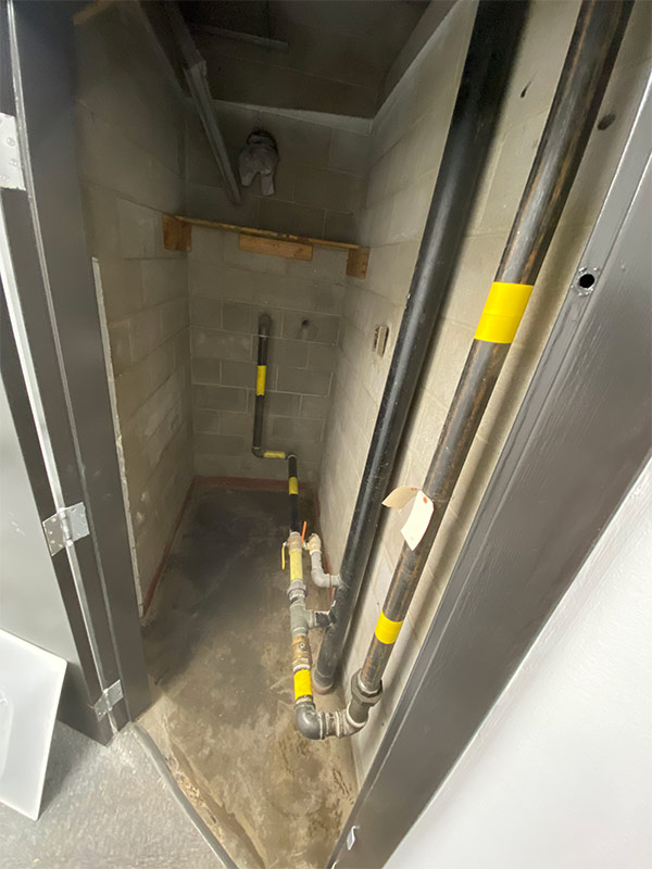 Pipe room after professional cleaning - organized and dust-free